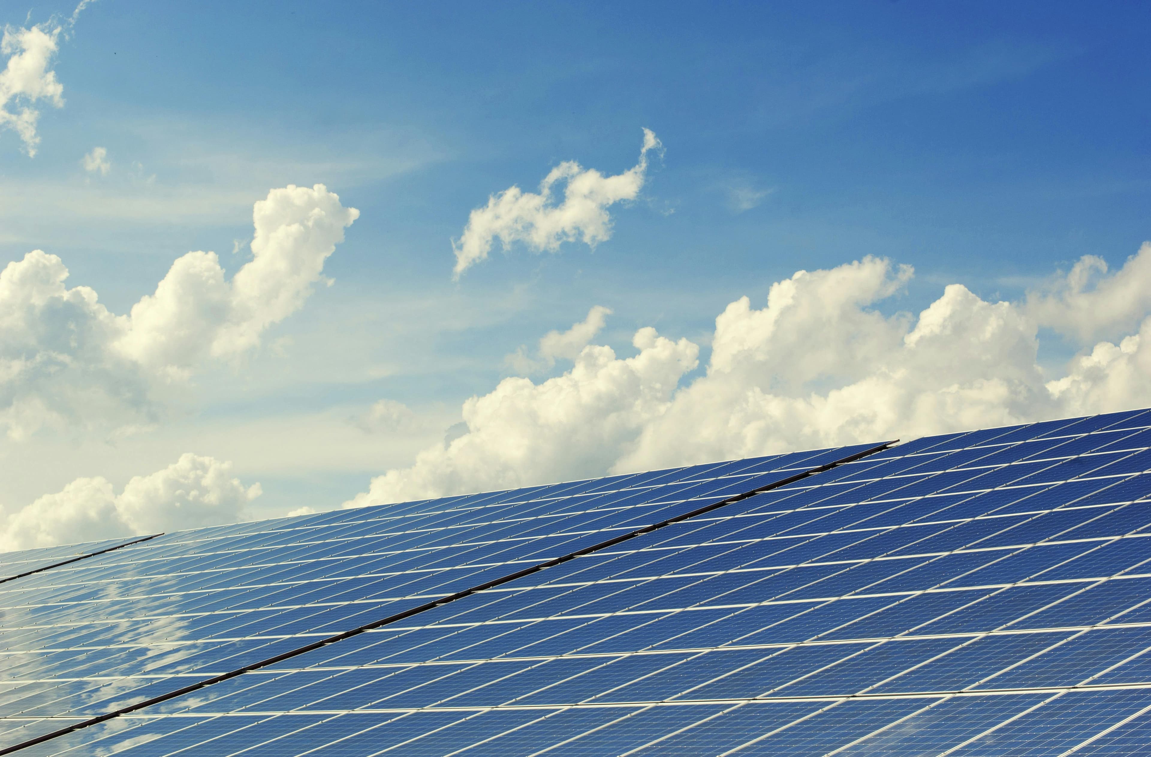 Solar panels under a blue sky